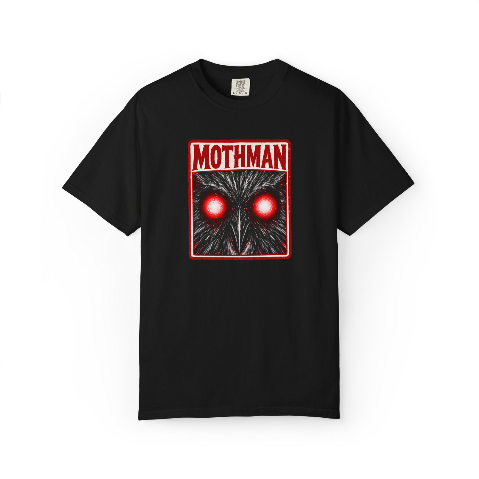 Black Mothman shirt with glowing red eyes, close-up cryptid face artwork, and red MOTHMAN text