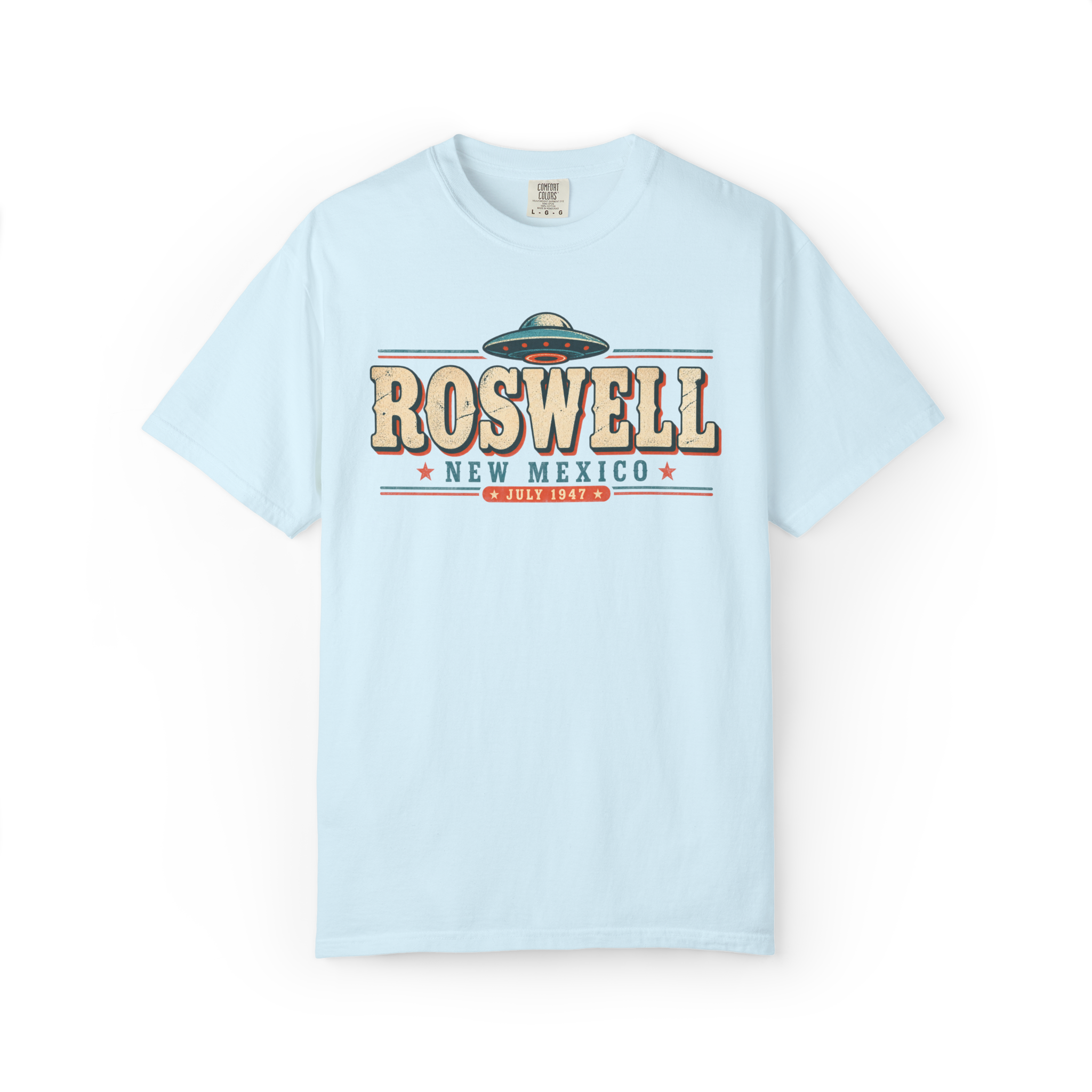 Light blue Roswell UFO t shirt featuring a vintage flying saucer with Roswell New Mexico and July 1947 text