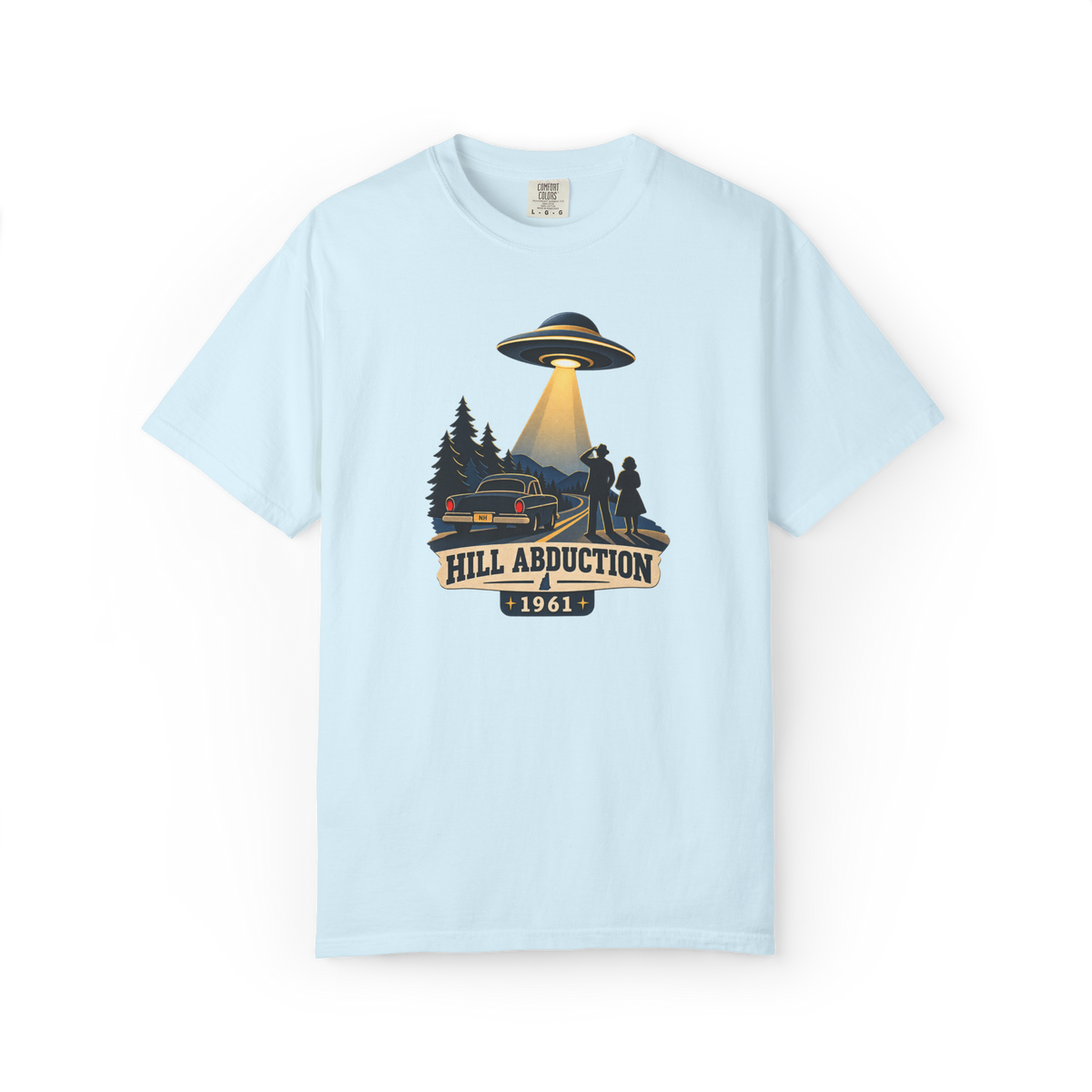 Light blue Betty and Barney Hill shirt featuring a 1961 UFO abduction scene with flying saucer, vintage car, and New Hampshire mountain road