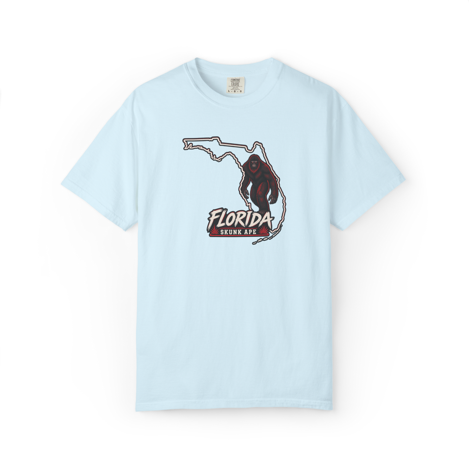 Light blue Florida Skunk Ape t shirt with a Florida state outline, dark red-brown skunk ape graphic, and Florida Skunk Ape text