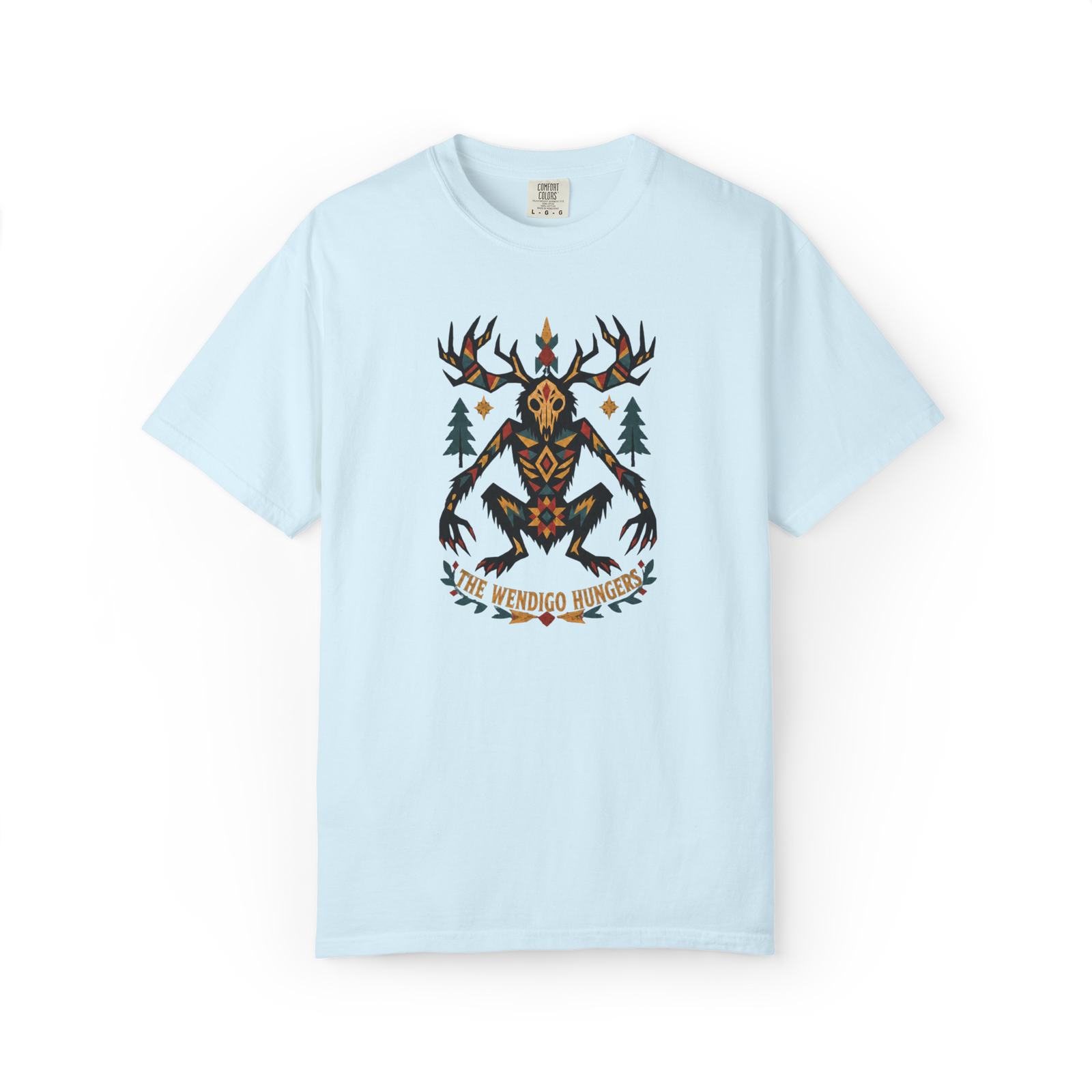 Light blue Wendigo t shirt with geometric antlered creature artwork, forest trees, orange and red details, and The Wendigo Hunters text