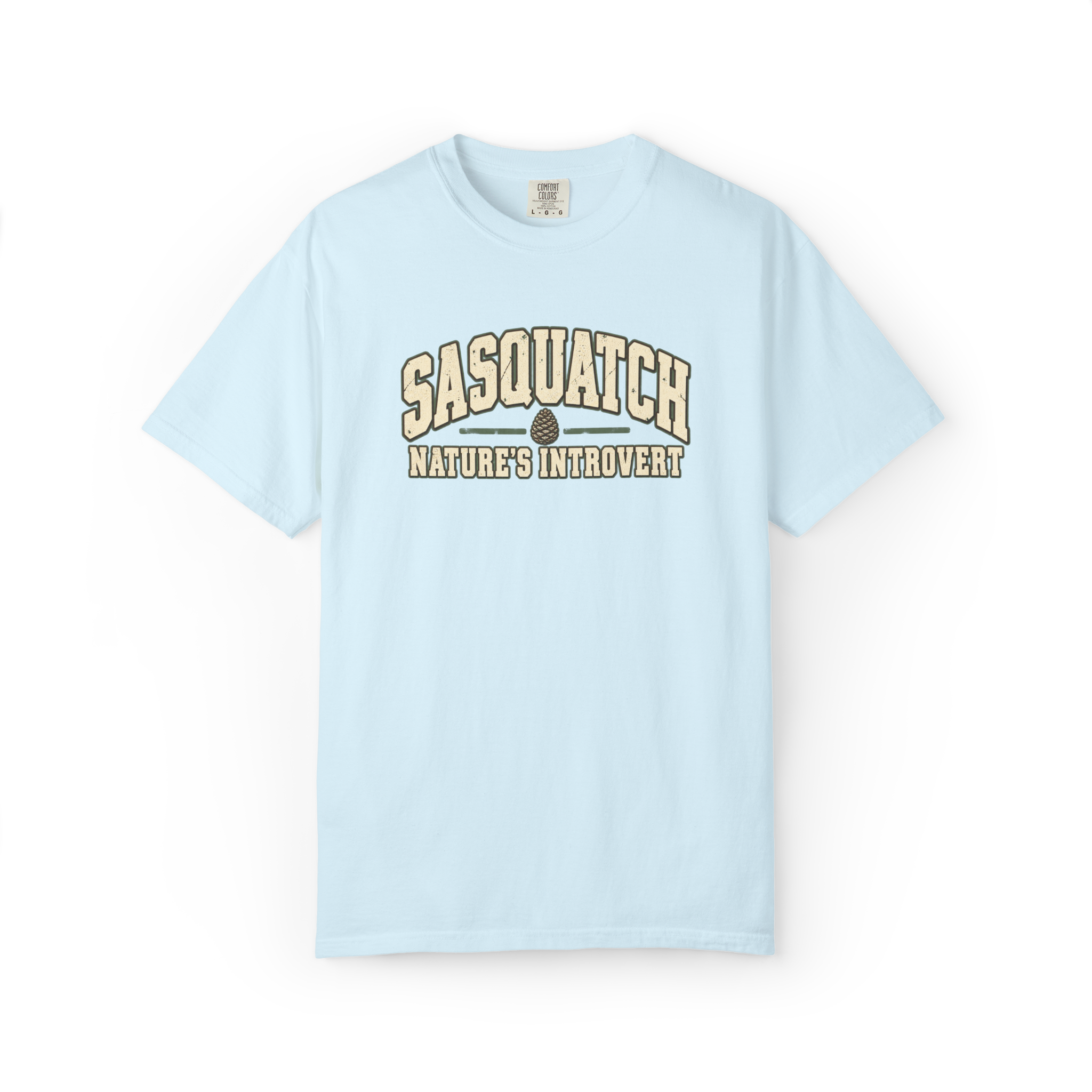 Light blue Sasquatch t shirt with vintage collegiate Sasquatch lettering, pine cone graphic, and Nature’s Introvert text