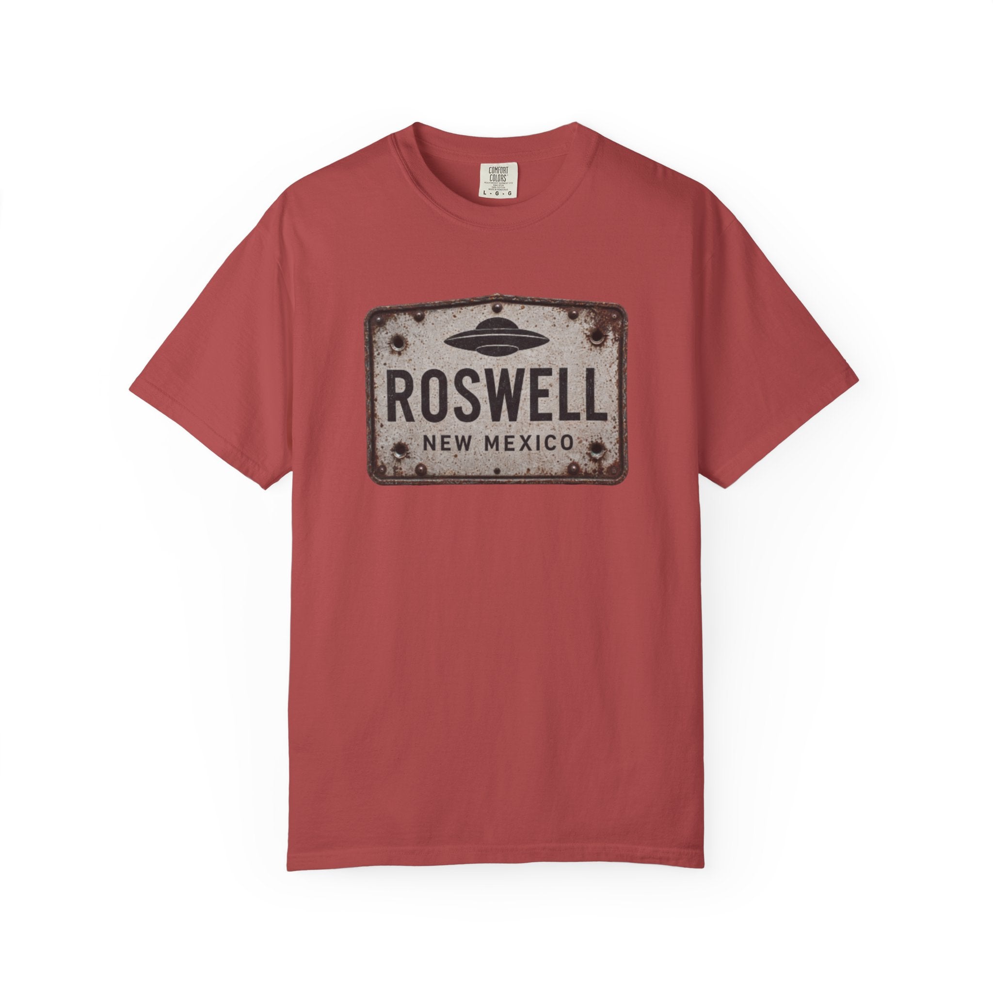 Crimson Roswell UFO shirt featuring a distressed Roswell New Mexico metal sign with a flying saucer graphic