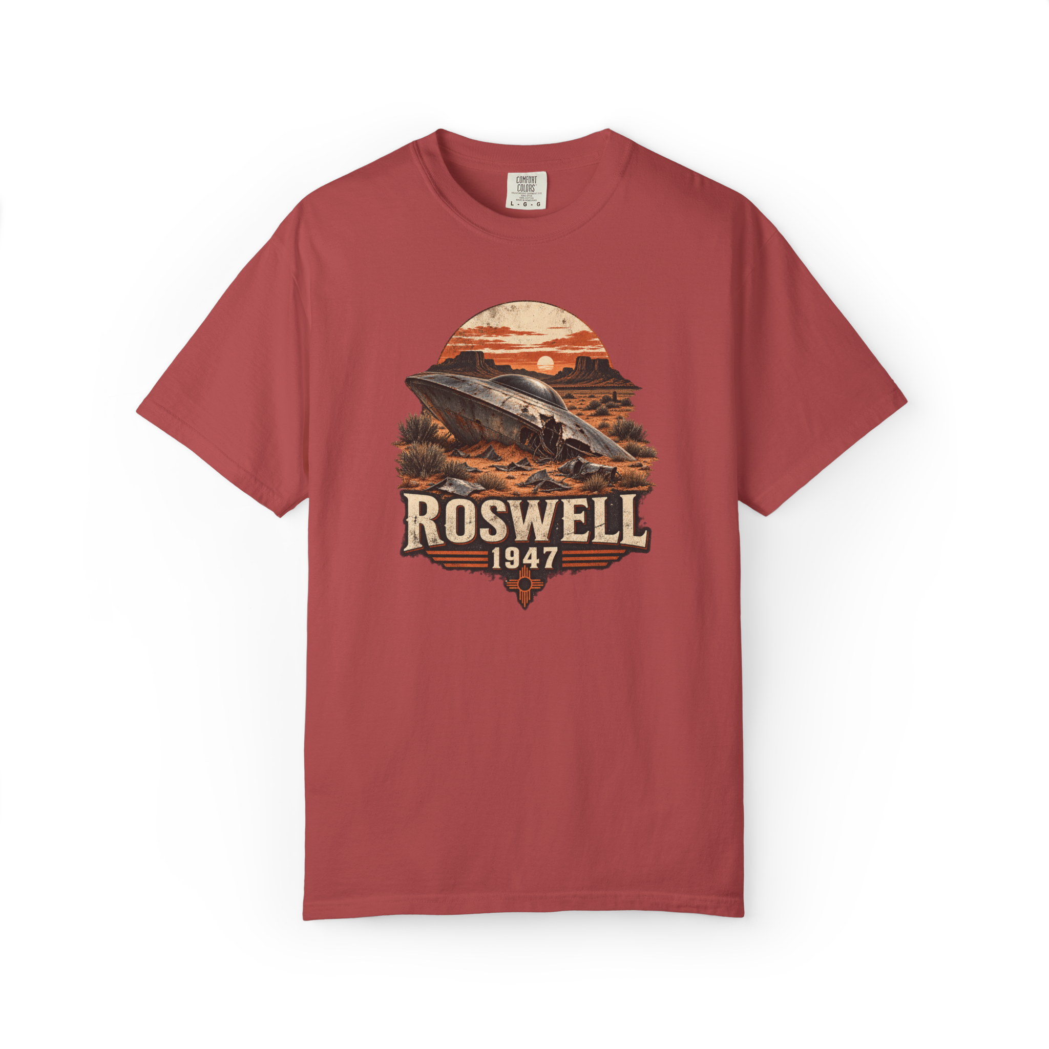 Crimson Roswell UFO shirt featuring a crashed flying saucer in a New Mexico desert with Roswell 1947 text
