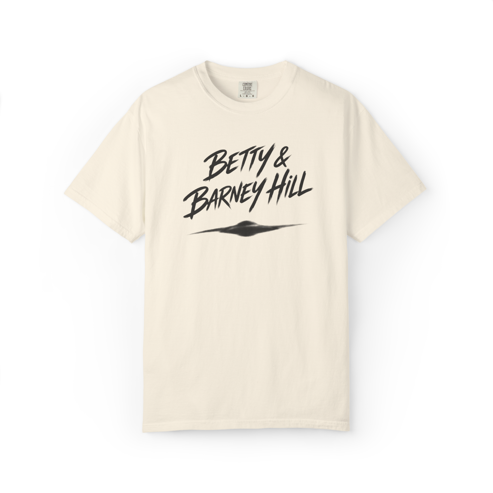 Cream Betty and Barney Hill shirt featuring bold script text and a blurry UFO graphic
