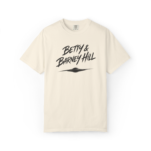 Cream Betty and Barney Hill shirt featuring bold script text and a blurry UFO graphic