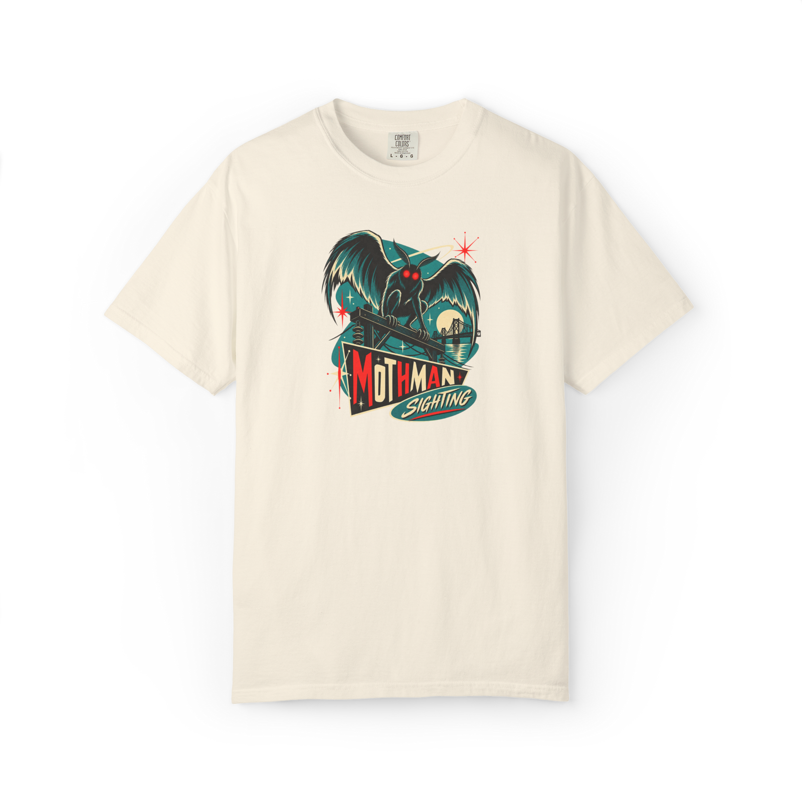Ivory Mothman t shirt with retro Mothman Sighting graphic featuring a red-eyed winged cryptid, bridge, utility structures, and teal red artwork