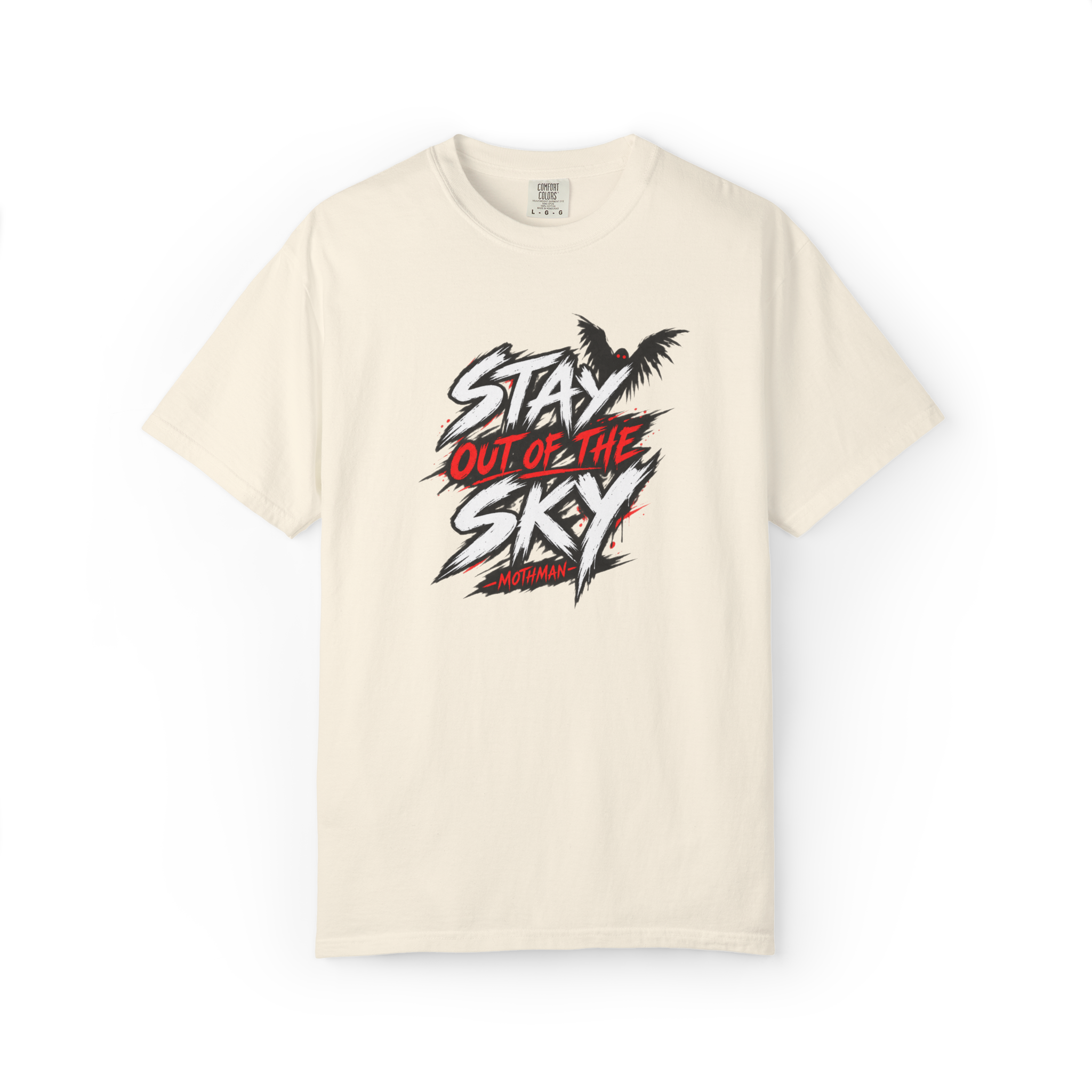Ivory Mothman t shirt with black white and red Stay Out of the Sky lettering and a small red-eyed winged Mothman graphic