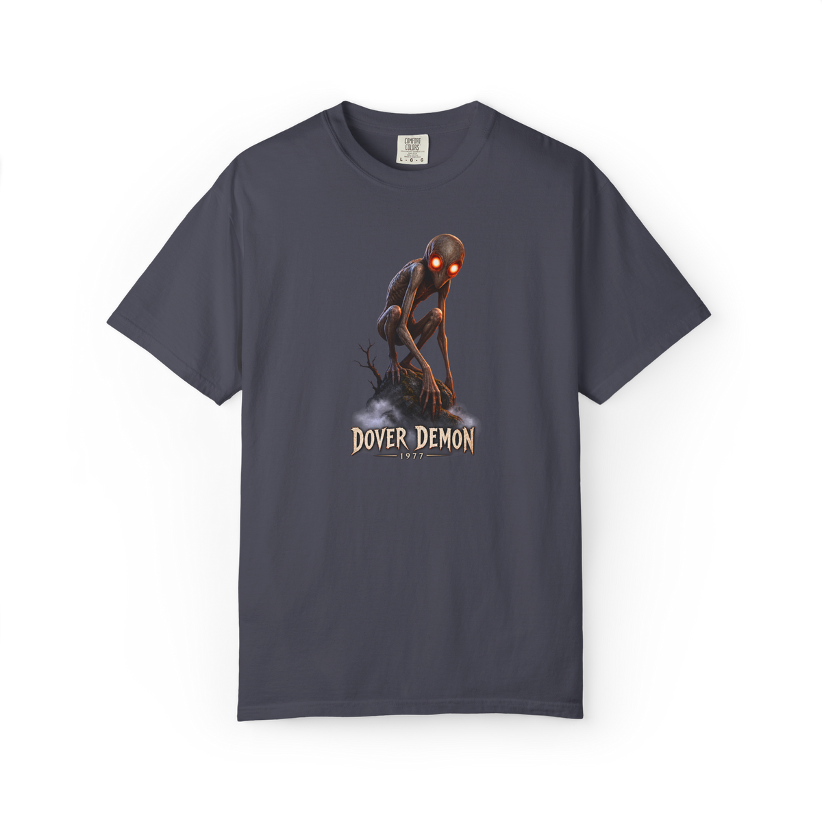 Navy Dover Demon shirt featuring the glowing-eyed 1977 Massachusetts cryptid crouched on a dark rocky perch