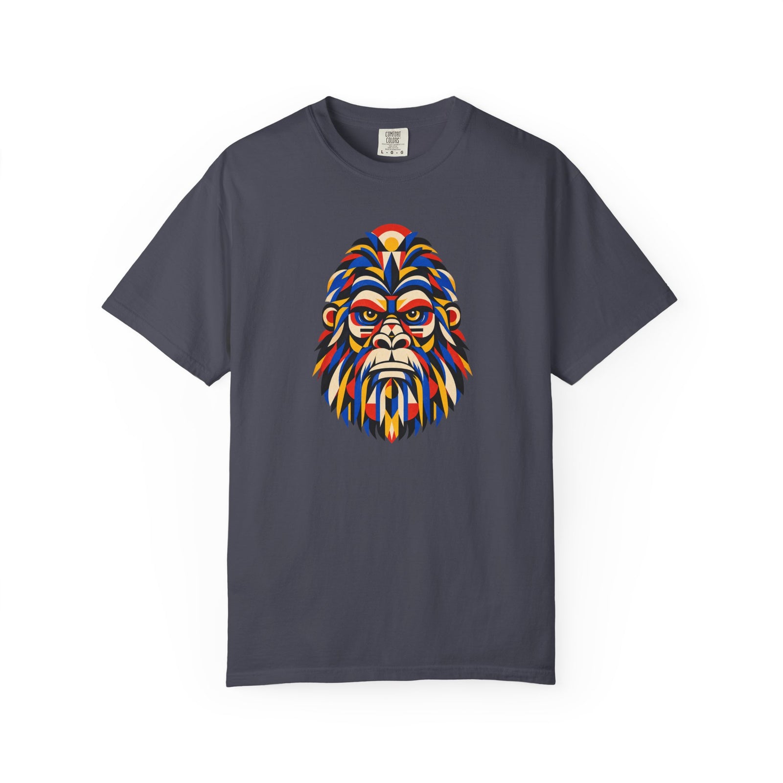 Dark navy Bigfoot t shirt featuring a colorful geometric Sasquatch face in red, blue, gold, cream, and black