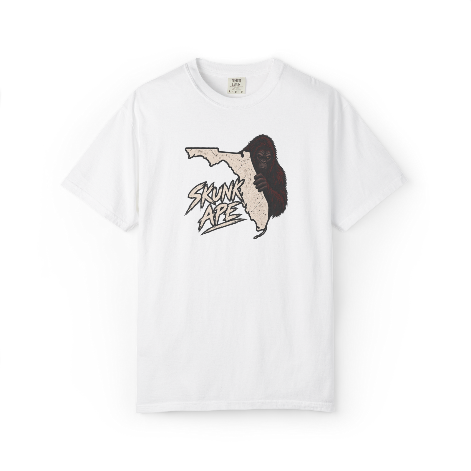 White Skunk Ape t shirt with a distressed Florida state outline, peeking red-brown skunk ape, and Skunk Ape text