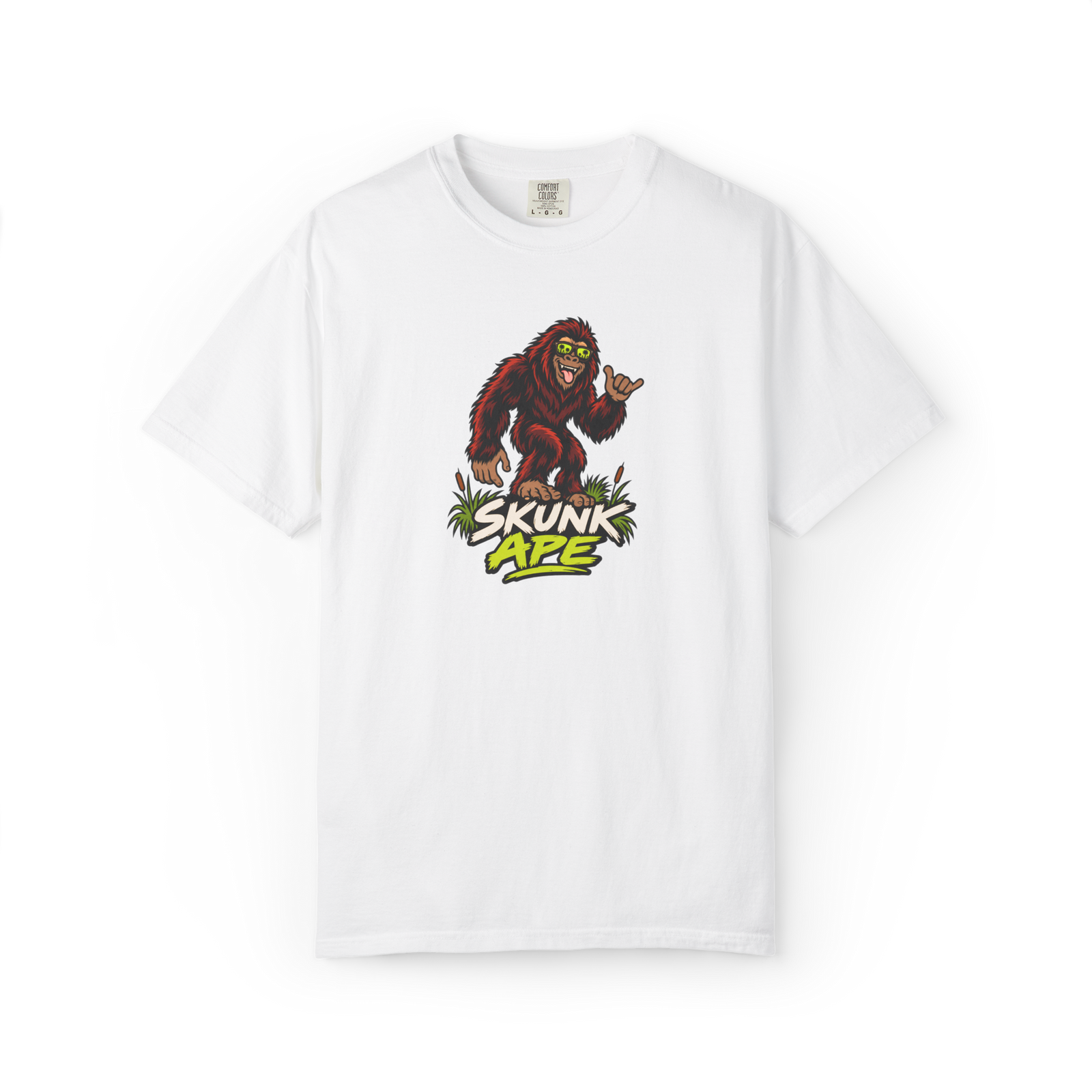 White Skunk Ape t shirt with a cartoon red-brown skunk ape wearing green shades and making a playful hand gesture above Skunk Ape text