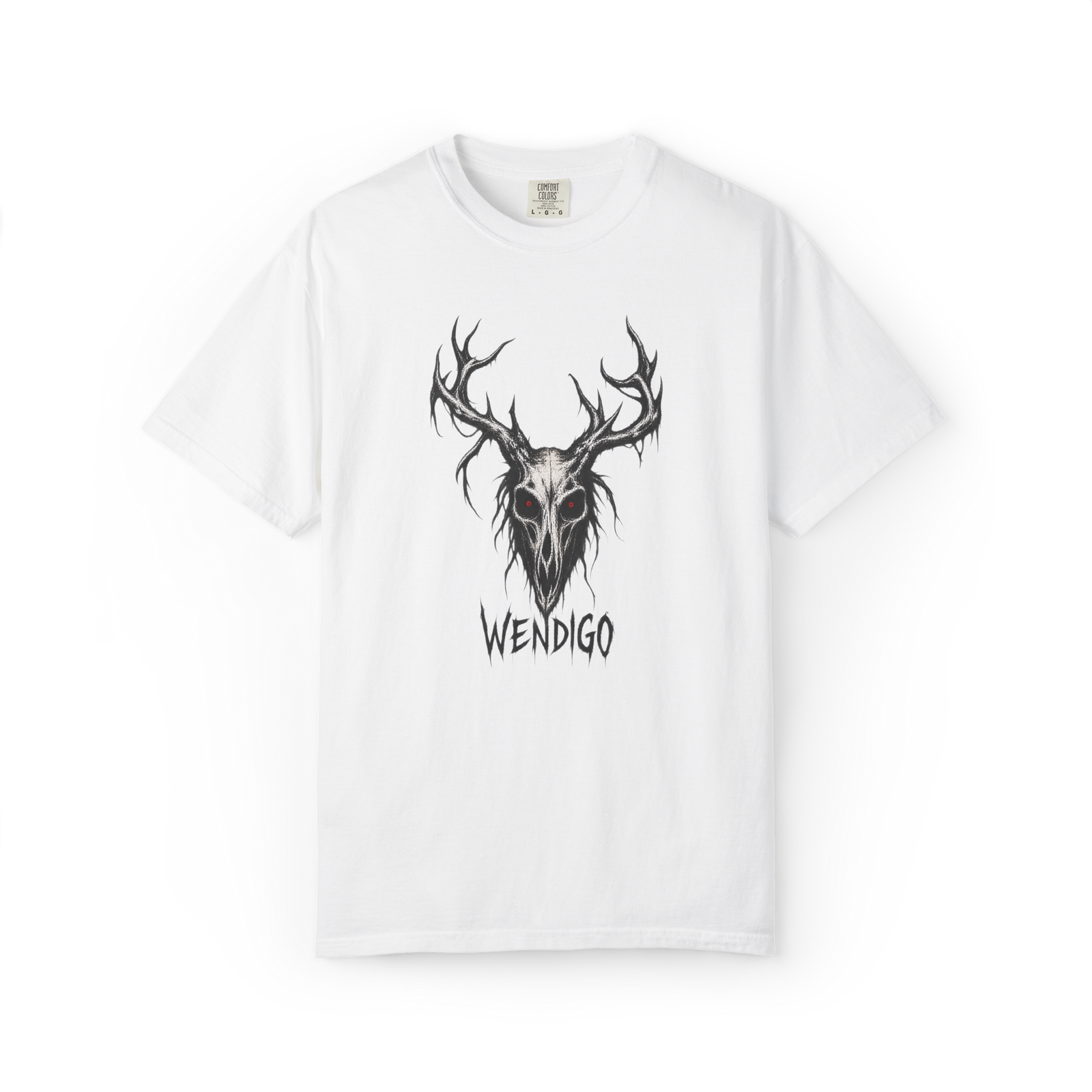 White t-shirt featuring a dark antlered Wendigo skull design with glowing red eyes and the word “Wendigo” underneath.