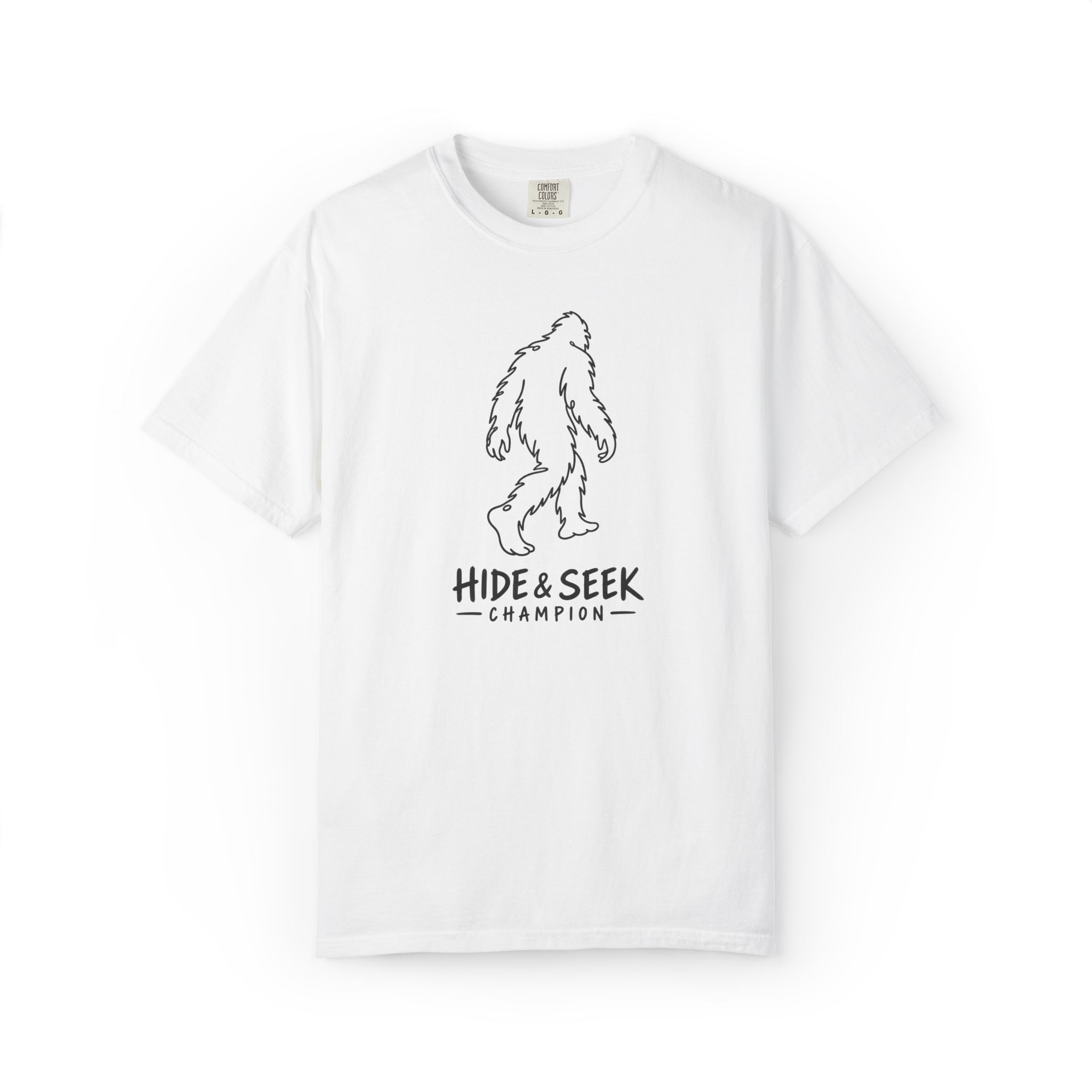White Bigfoot t shirt with minimalist walking Sasquatch outline and Hide & Seek Champion text