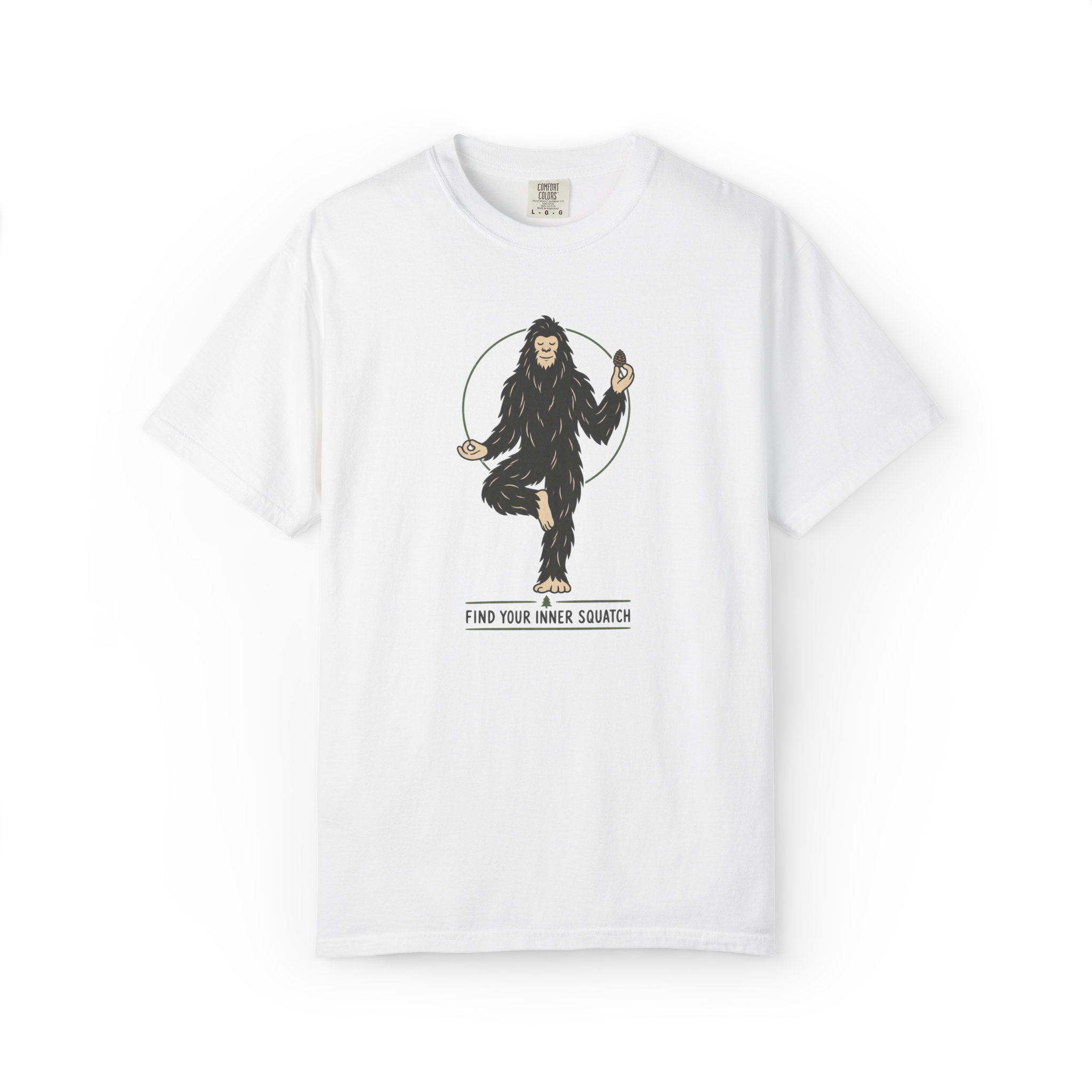 White Bigfoot t shirt featuring a meditating Sasquatch in a yoga pose holding a pine cone with Find Your Inner Squatch text