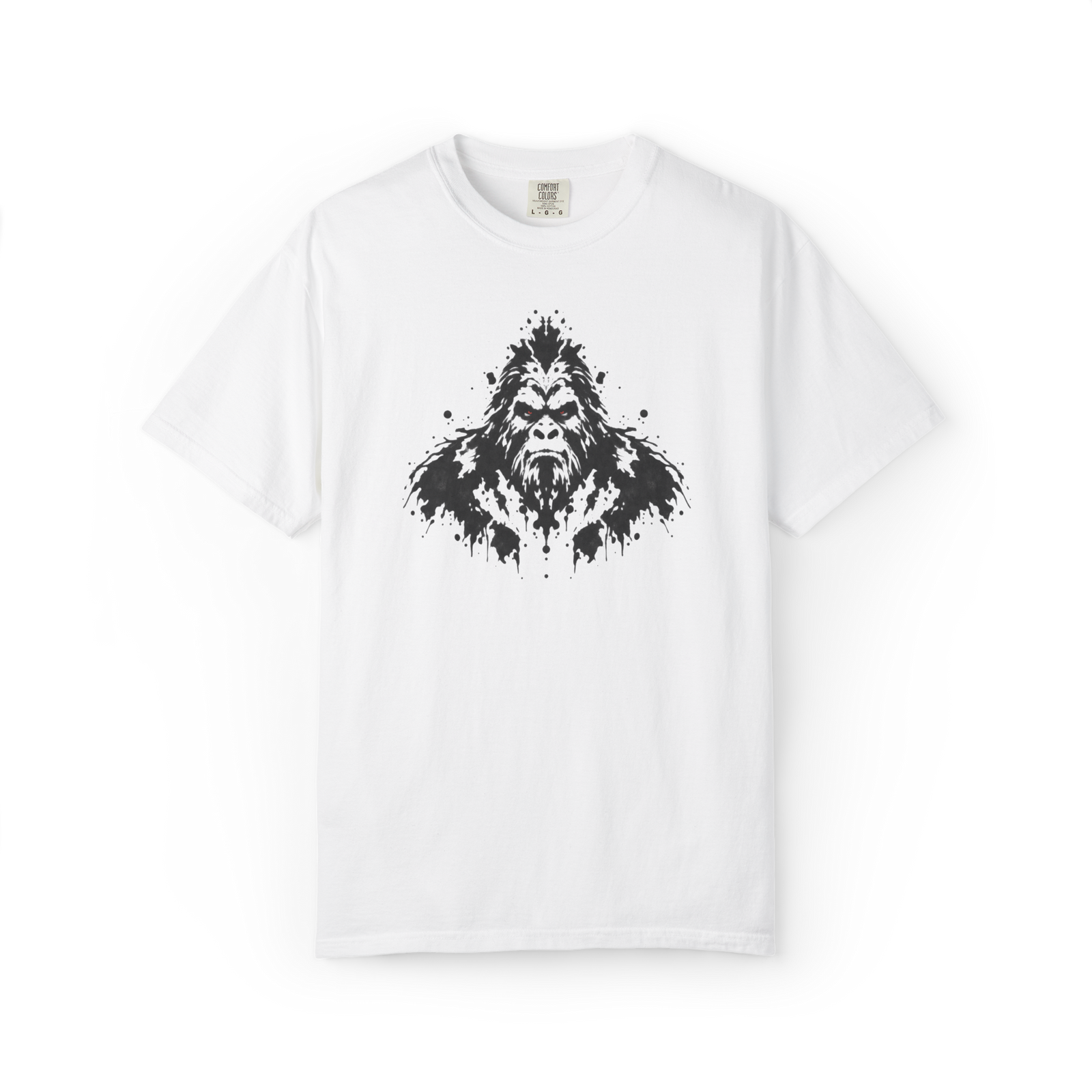 White Bigfoot t shirt featuring a black ink splatter Sasquatch face with distressed grunge-style artwork