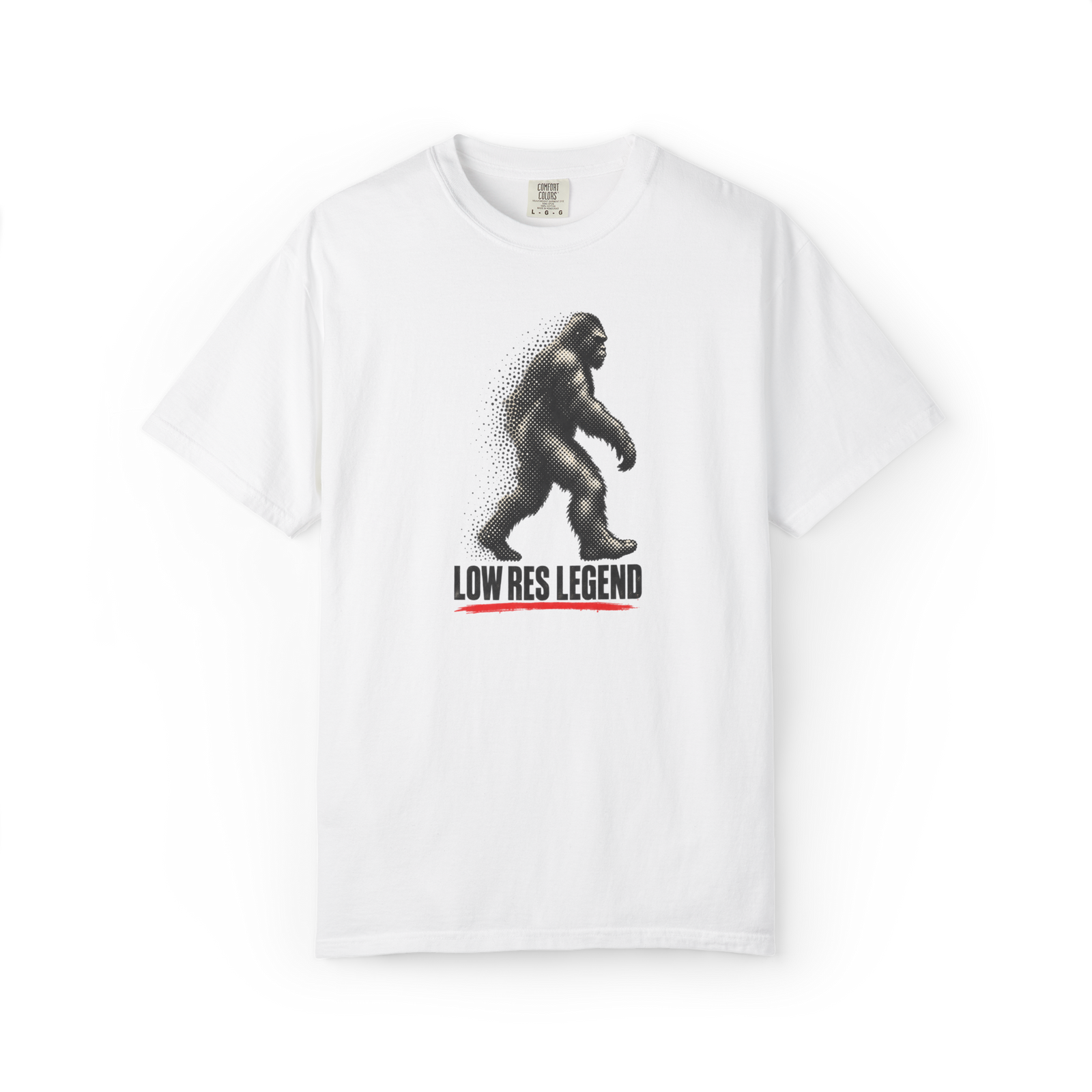 White Bigfoot shirt featuring a faded walking Sasquatch graphic with the text Low Res Legend and a red underline