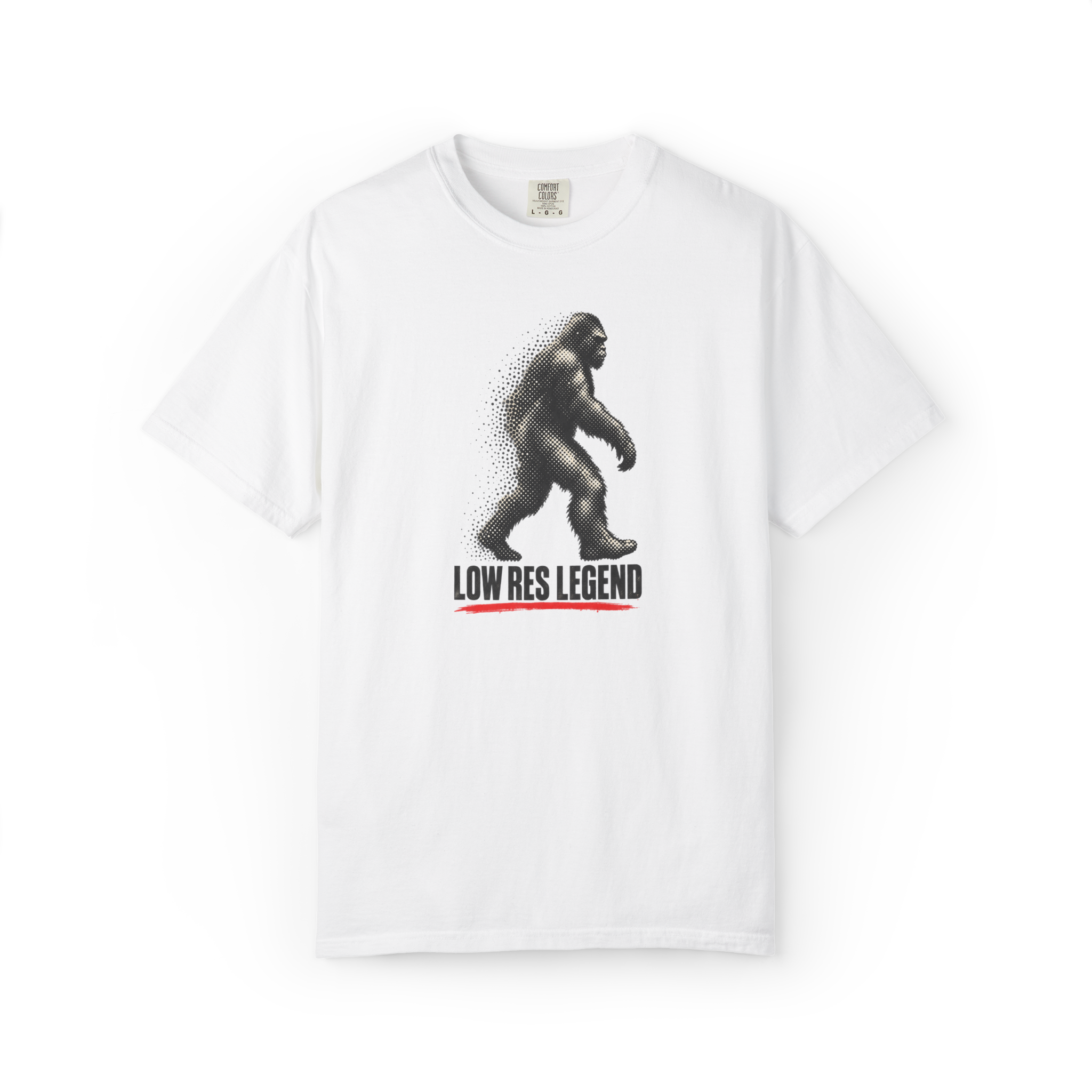 White Bigfoot shirt featuring a faded walking Sasquatch graphic with the text Low Res Legend and a red underline