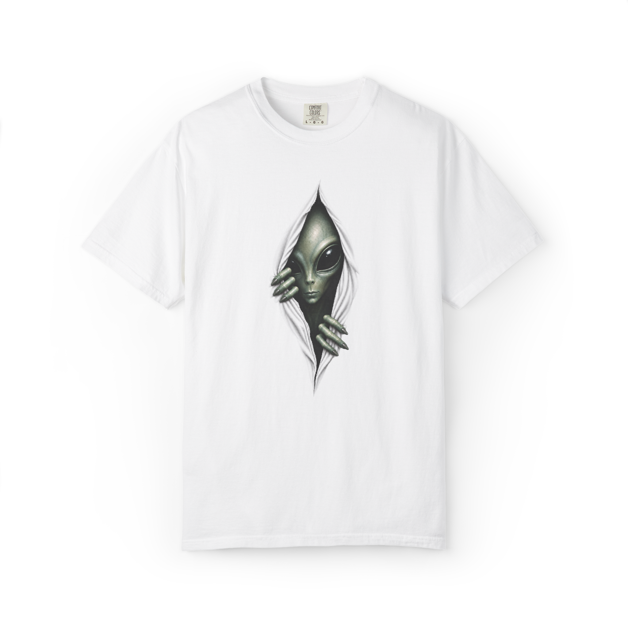 White alien shirt featuring a realistic grey alien peeking through a torn opening graphic