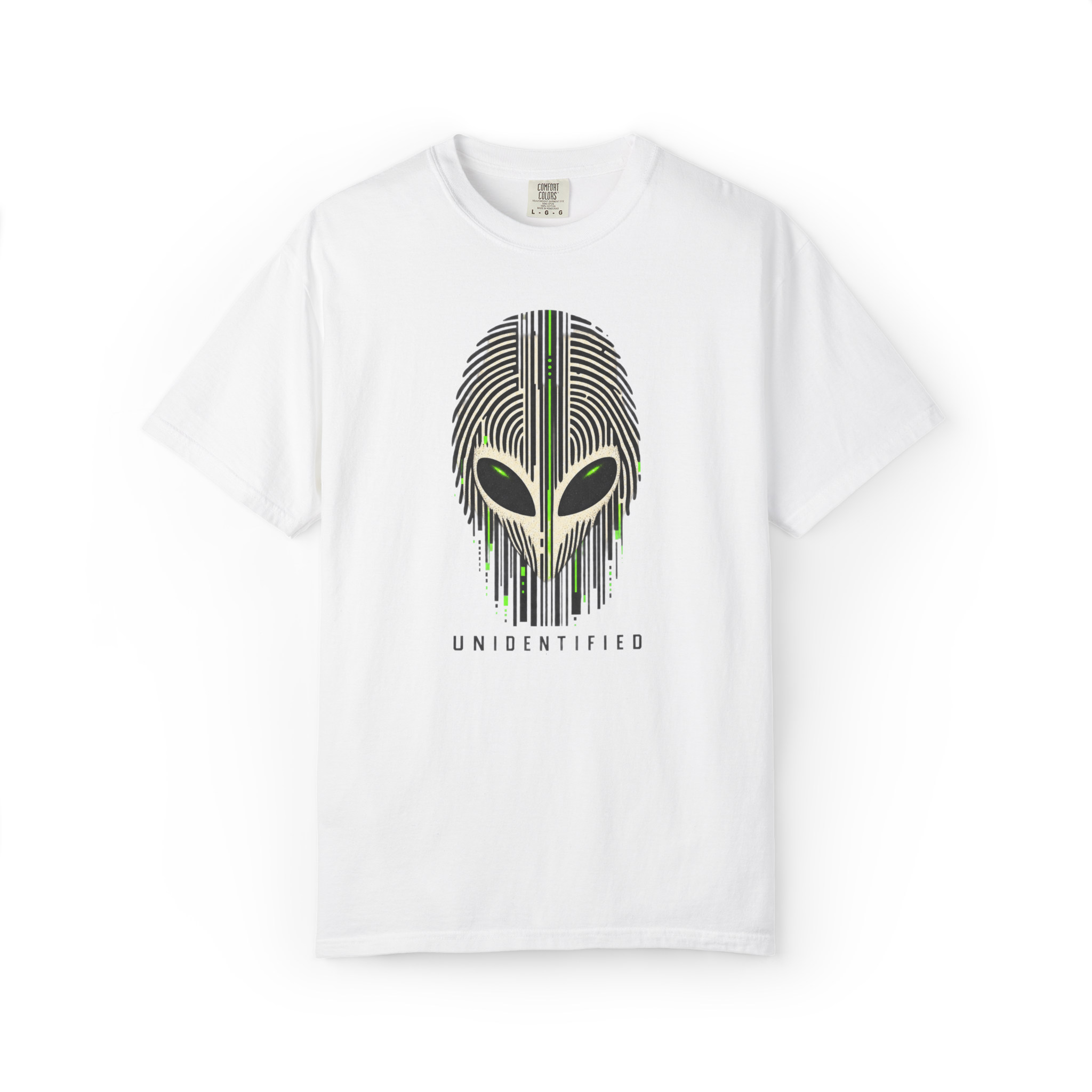 White alien shirt with a fingerprint-style extraterrestrial face, glowing green eyes, and Unidentified text