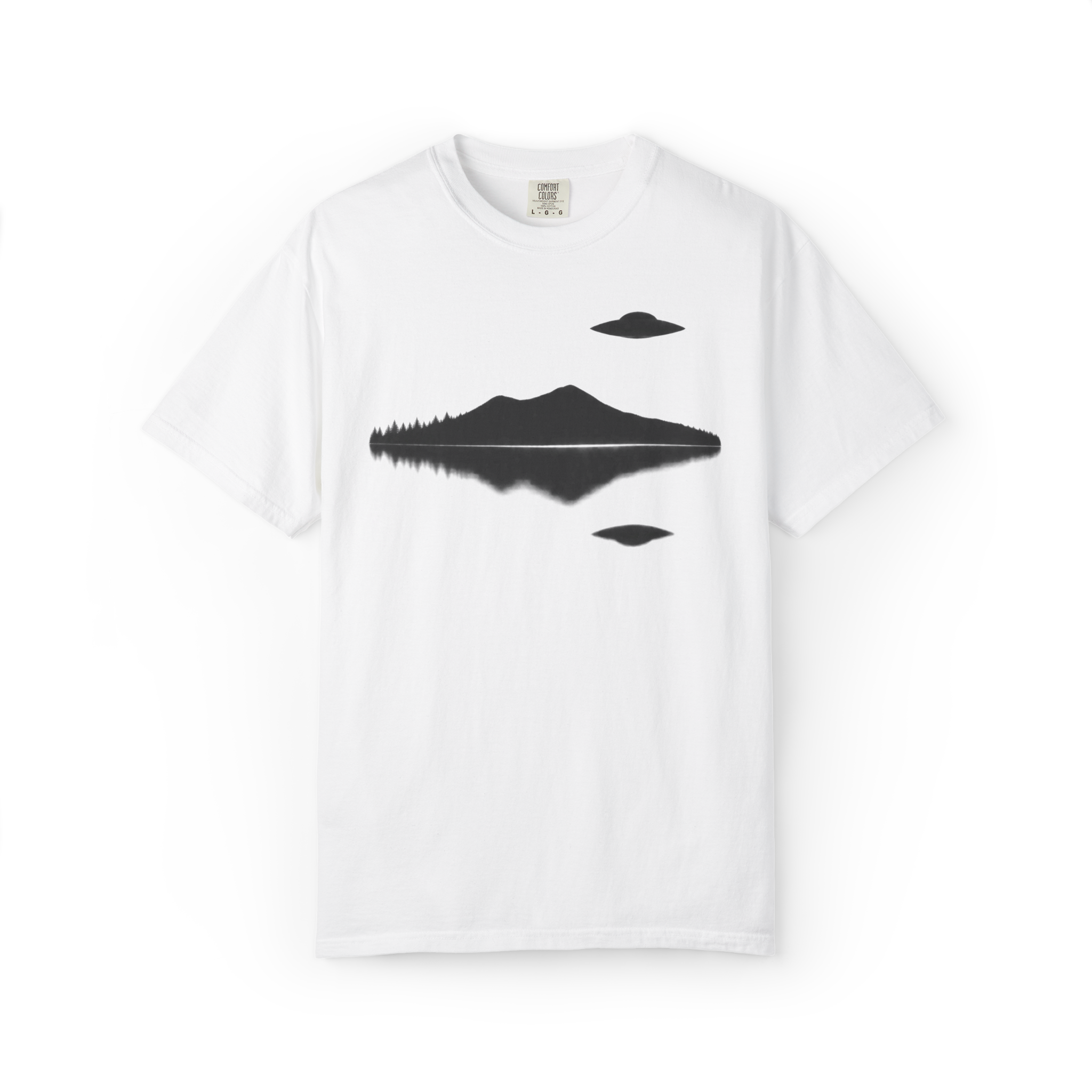 White UFO shirt featuring a black mountain reflection design with two flying saucers
